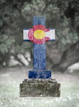 Old weathered gravestone in the cemetery - Colorado