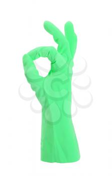 Hand gesturing with green cleaning product glove - isolated on white