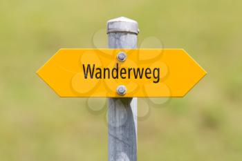 Bergwanderweg sign in the mountains, navigation for hikers, Switzerland