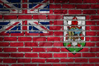 Dark brick wall texture - flag painted on wall - Bermuda