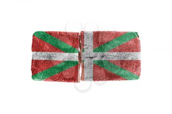 Rough broken brick, isolated on white background, flag of Basque Country