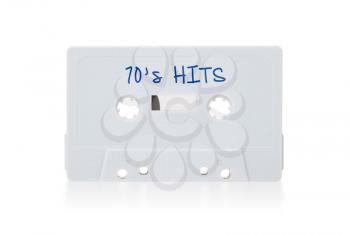 Vintage audio cassette tape, isolated on white background, best of the 70s