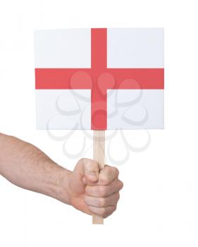 Hand holding small card, isolated on white - Flag of England
