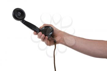 Male hand holding retro landline telephone, nearly broken cable