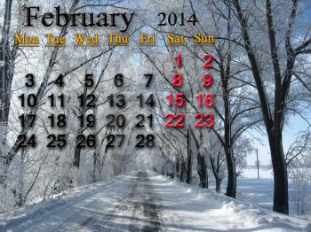 calendar for the February of 2014  on the background of snow-covered road and hoarfrost on the trees