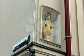 nice sculpture of God's mother Maria in wall of building in Lvov
