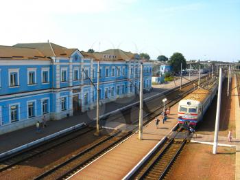 View to the building of railway station and the train