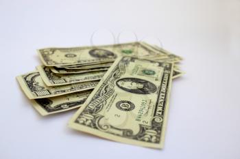 Some dollar banknotes isolated on a white background