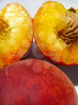 image of ripe peach cut with seed