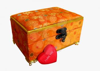 Beautiful gold casket in a gift for a holiday to the Valentine's day