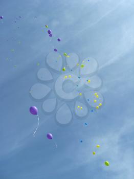 image of color balloons flying away to the sky