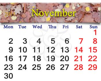 calendar for November of 2015 with the ribbon of red and yellow leaves