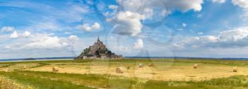Panorama of Mont Saint Michele abbey in a beautiful summer day, France
