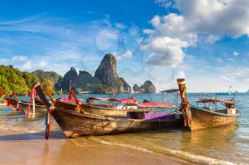 Traditional long tail boat on Railay Beach, Krabi, Thailand in a summer day