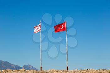 Flags of Turkey and North Cyprus in a beautiful summer day