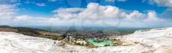 Panorama of Travertine pools and terraces in Pamukkale, Turkey in a beautiful summer day