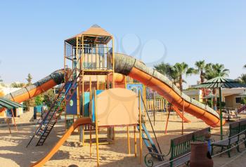 Playground for kids at sun light. Game Playground outdoor.