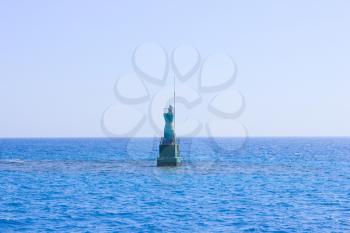 Marine Buoy Floating in Water. Sea at Sun Light. Sea Water Backround.