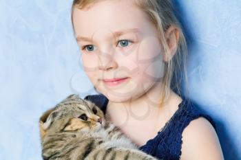 Image of beautiful girl with grey kitty