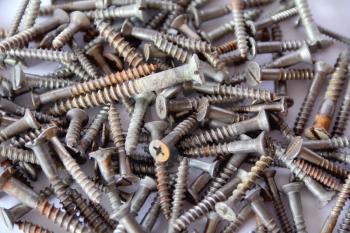 Image of background with screws, nuts and tools