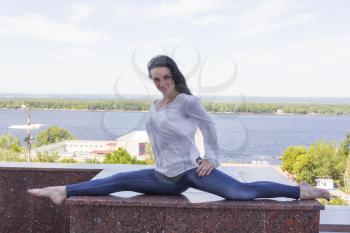 Photo of young woman in pose twine