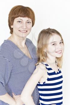 Close portrait of beautiful happiest mother and daughter