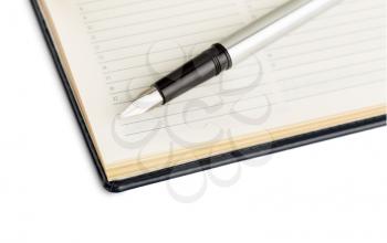 Agenda. Scheduling. Organizer and fountain pen (closeup shot, shallow DOF) isolated on white with place for text
