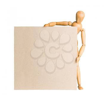 Wooden model dummy holding blank square carton board isolated on white. 