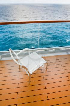 textile chair on balcony of sea cruise liner