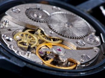 disassembled open old black wristwatch