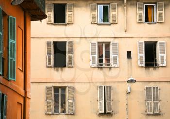 wall with windows of old town house in Nice, France