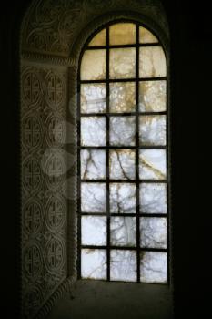 alabaster glass window in acient church (Germigny-des-Pres, France)