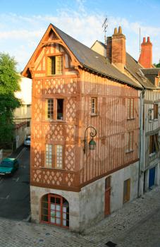 old narrow corner timber framing house in Orleans, France