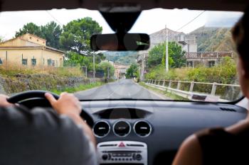 driving a car on rural road in Italy