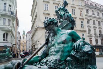 statue of Donnerbrunnen fountain, (Allegorie of Enns river), Vienna, Austria