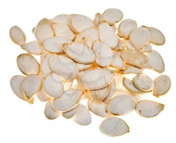 handful of pumpkin seeds isolated on white background