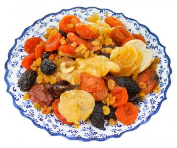 dried sweet fruits on turkish plate isolated on white background
