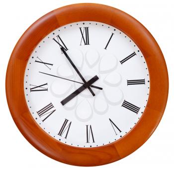 five minutes to eight o clock on round dial clock