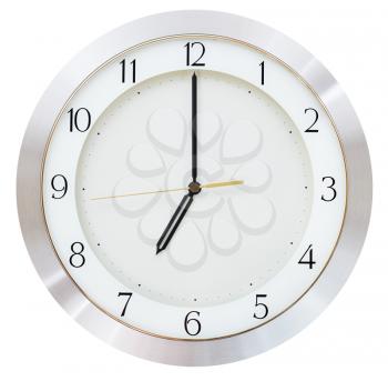 seven o clock on the dial round wall clock