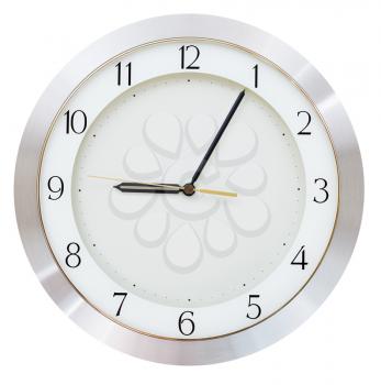 nine o clock and five minutes on the clock face round wall clock