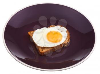 sandwich from fried egg and toast on plate isolated on white background