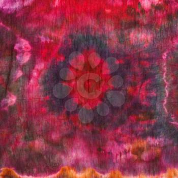 abstract red pattern of painted silk batik on handmade scarf