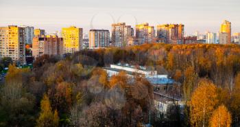 panoramic view of urban residential district in pink autumn sunset