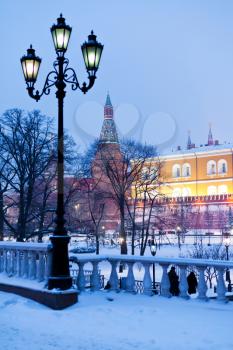 snow in Moscow - view of Alexander Garden in winter snowing evening
