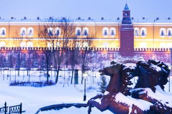 snow in Moscow - view of Alexander Garden in blue winter snowing evening