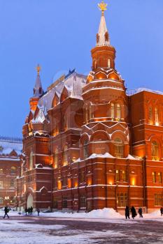snow in Moscow - State Historical Museum building in winter evening