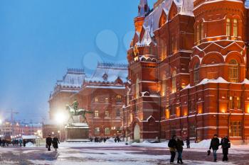 snow in Moscow - State Historical Museum building on Manege Square in winter evening