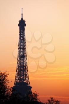 eiffel tower in Paris on yellow sunset