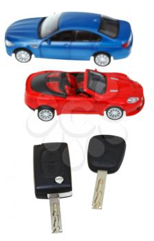 top view two vehicle keys and model cars isolated on white background