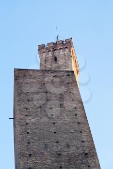 Due Torri - two tower - symbol of city under blue sky in Bologna, Italy